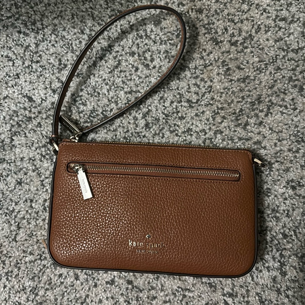 Kate spade wristlet -camel with black piping